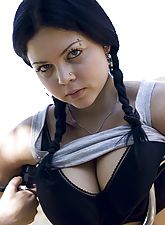 Alternative babe strips on her bike