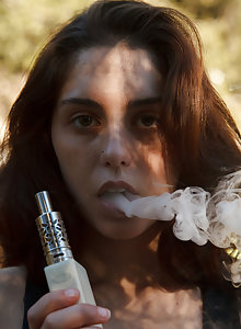 Sexy Christine Ash vaping in the great outdoors